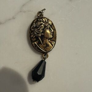 Gold-color and Black Cameo Pendant